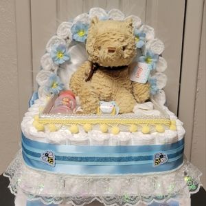 Diaper cakes Winnie the Pooh Vintage, Pampers Swaddlers, Blue Carriage